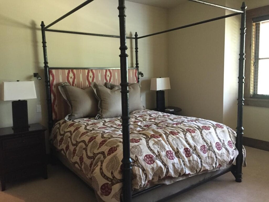 Iron Canopy Cal King Bed with Ikat Upholstered Headboard